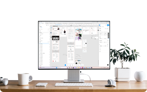 Desktop setup with design work on a monitor